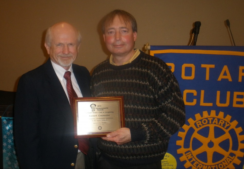 Rich Hempel received the Entrepreneurial Award for Earmark Construction from the Richland Rotary Club.